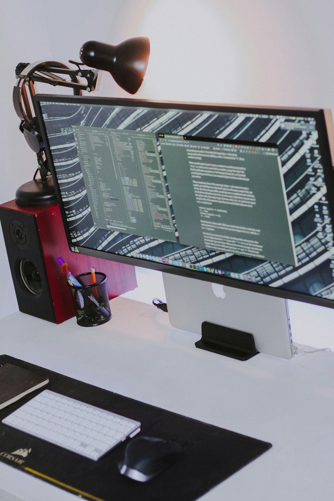 a-computer-monitor-sitting-on-top-of-a-desk-we8om4t4ne