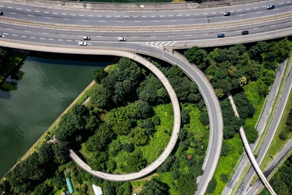 An aerial view of a highway intersection in a city