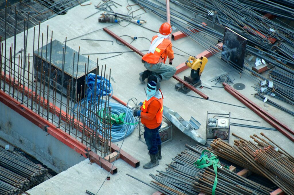 Photo by Etienne Girardet two men working